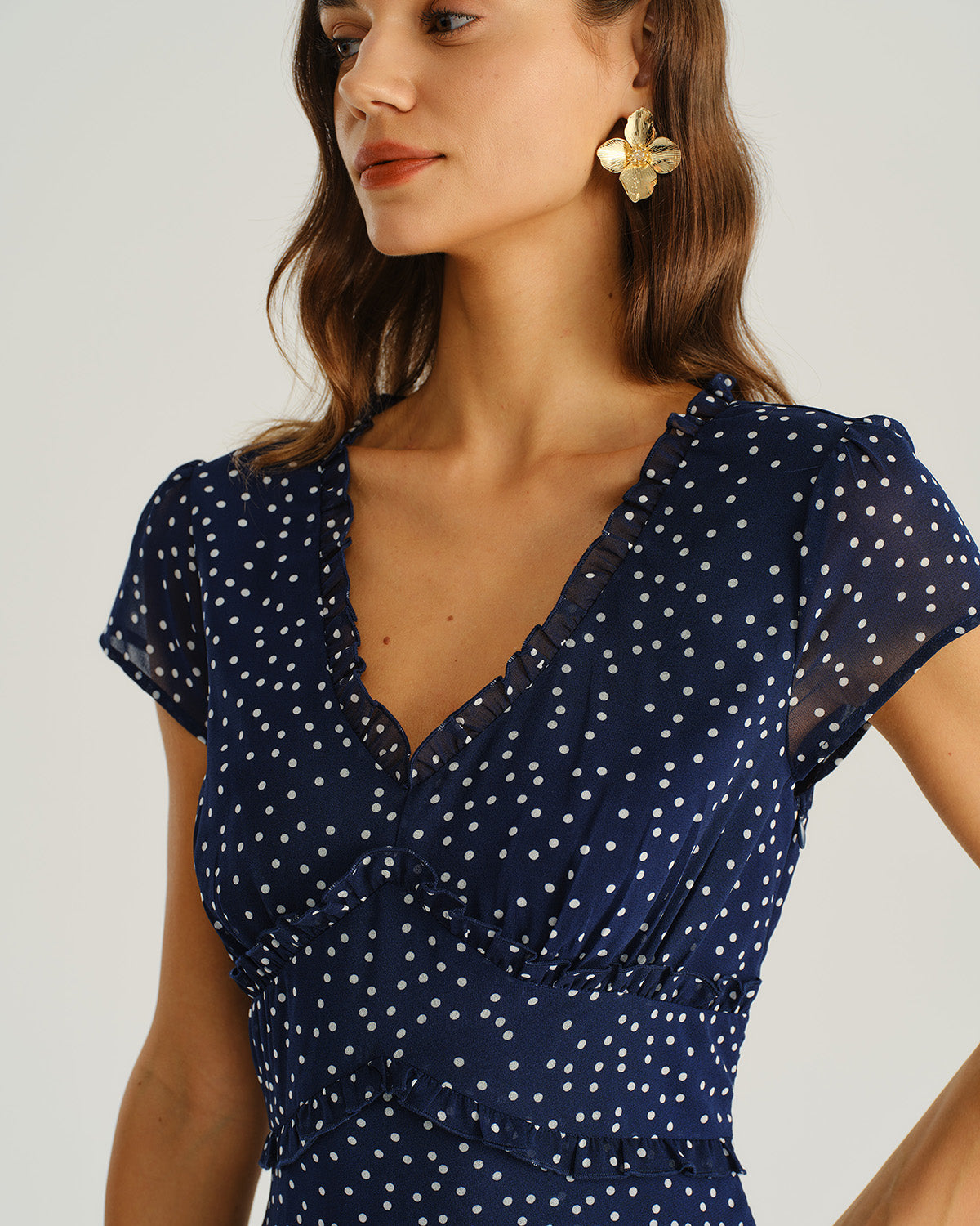 Vestido elegante azul marino con lunares