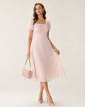 Vestido rosa de encaje y gasa con escote