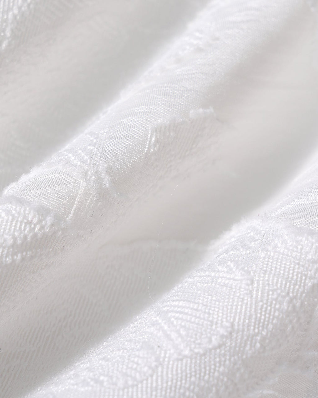 Pantalones cortos blancos de jacquard con bolsillos elegantes