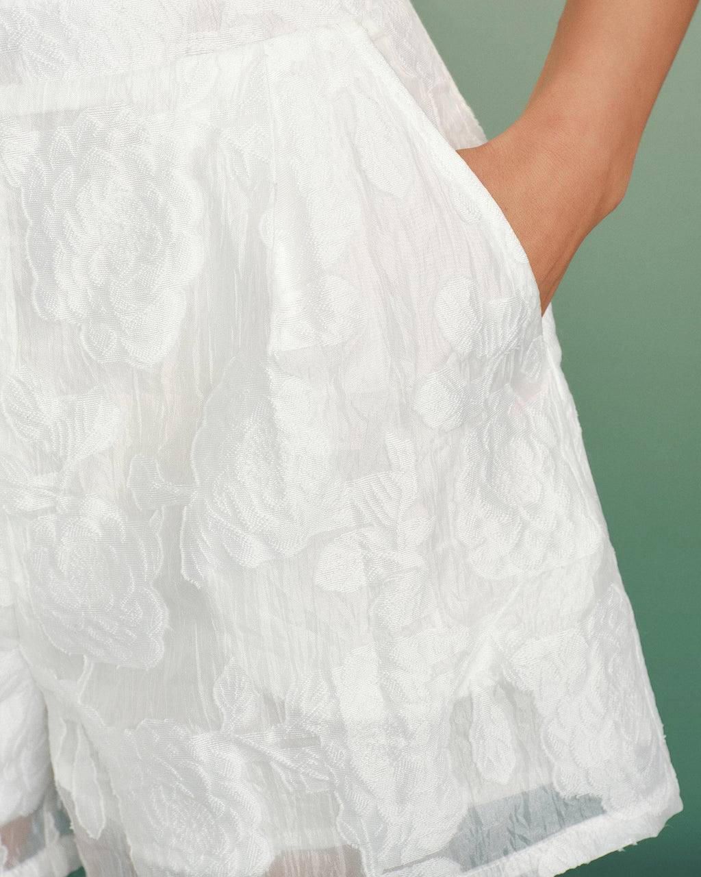 Pantalones cortos blancos de jacquard con bolsillos elegantes