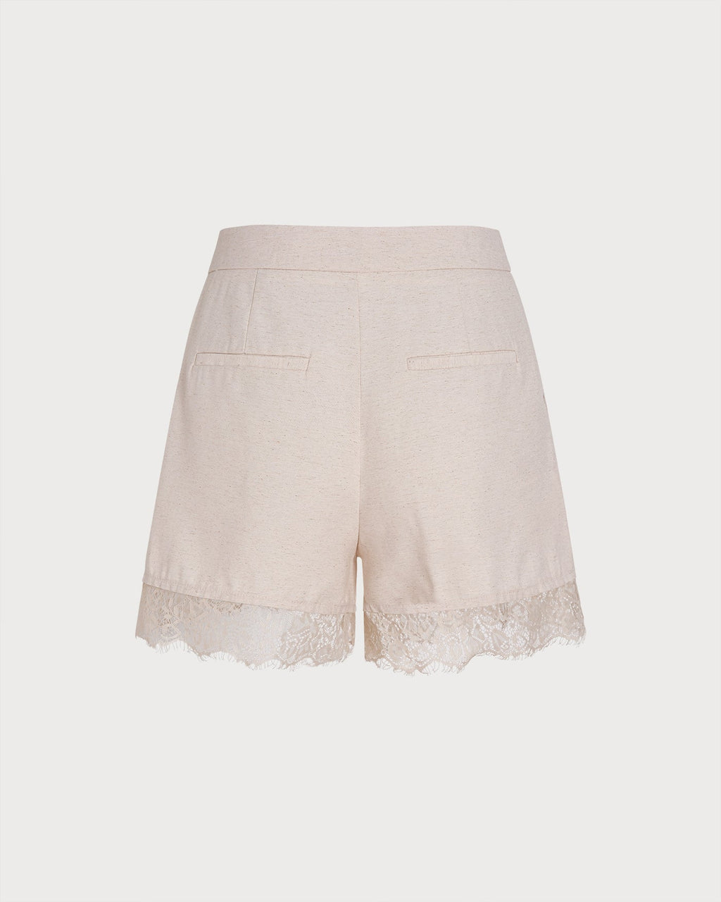 Pantalones cortos color albaricoque con ribete de encaje y bolsillos