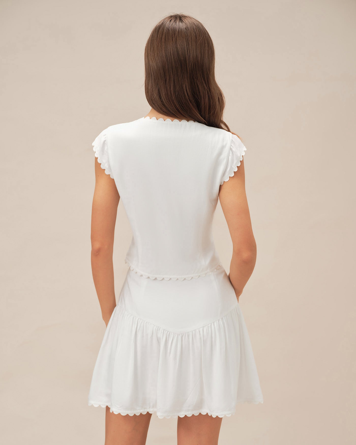 Falda blanca con botones