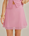 Elegante minifalda de gasa rosa lisa