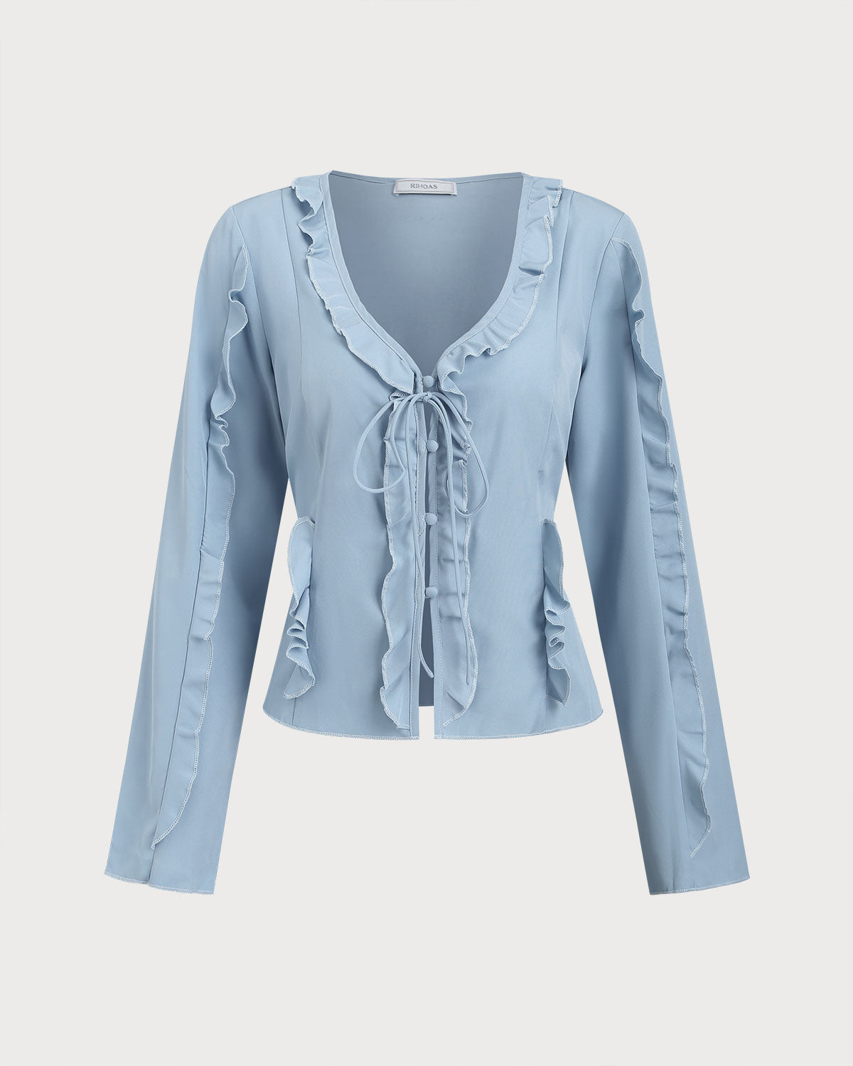 Blusa elegante azul con volantes, escote en V y botones delanteros