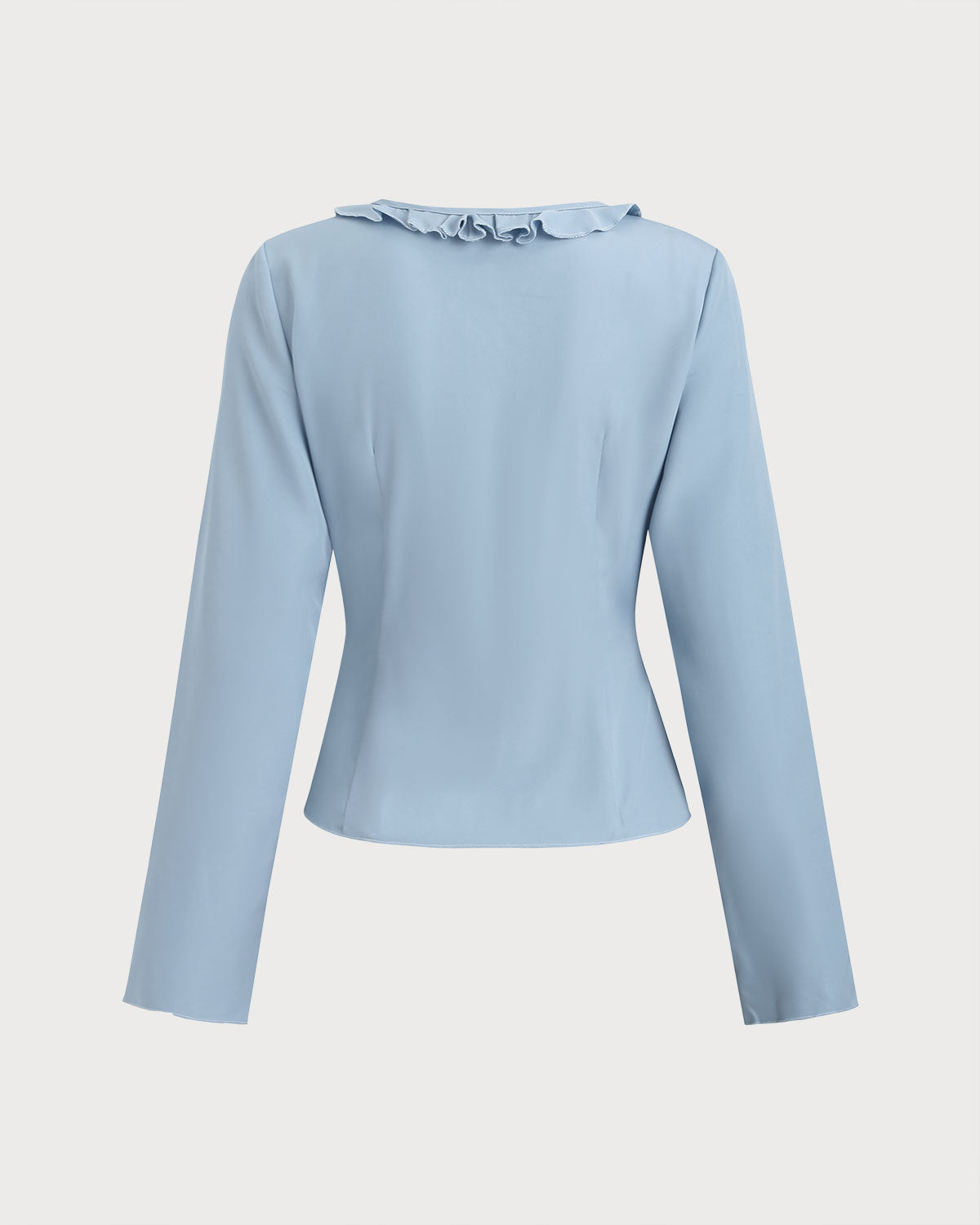 Blusa elegante azul con volantes, escote en V y botones delanteros